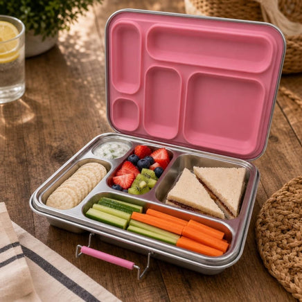 Large stainless steel lunchbox with five compartments on a wooden table, showcasing leak-resistant design and sleek metallic finish.